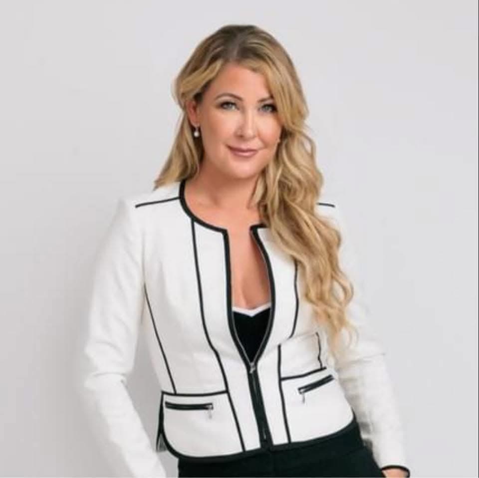 Portrait of Colorado real estate broker Erin Rose